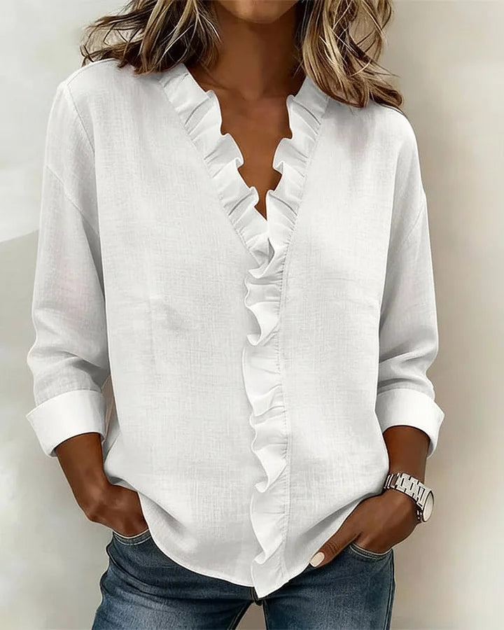 Clara Blusa con escote en V y volantes delicados
