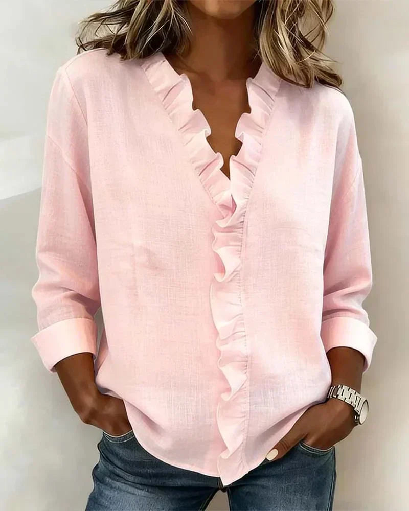 Clara Blusa con escote en V y volantes delicados