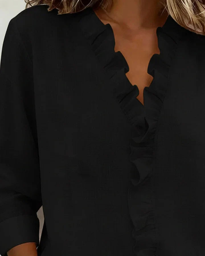Clara Blusa con escote en V y volantes delicados
