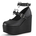 Zapatos de plataforma con corazón