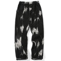 Pantalones vaqueros teñidos con la técnica Tie Dye